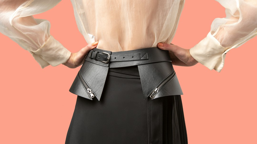 woman in black leather skirt